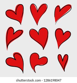 Vector set of red doodle hand drawn isolated hearts icons. Valentine's day design elements