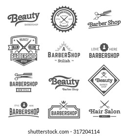  Vector set of retro barber shop labels, logo, badges and design element.