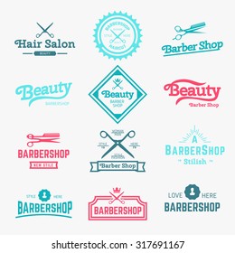  Vector set of retro barber shop labels, logo, badges and design element.