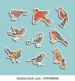 Vector set of retro patches, stickers, embroidery and sticky labels. Various birds sticky labels on blue background. 80s-90s style design.