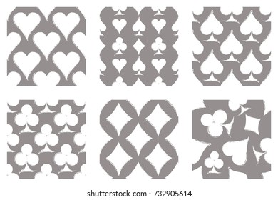 Vector set of seamless grunge patterns. Grungy graphic illustration of sign of playing card with ink blot, brush strokes. Endless background. Series of gaming and gambling seamless vector patterns.