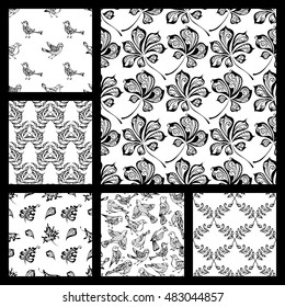 Vector set of seamless nature patterns. Hand-drawn black linear birds and leaves on white background. Oak, maple, birch, rowan, chestnut leaves. Duotone boundless backgrounds.