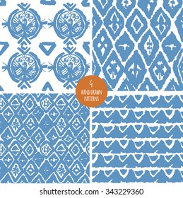 Vector set of seamless patterns. Hand drawn ikat ornament repeating backgrounds. 