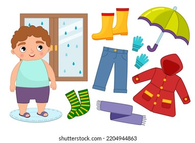 Vector set of seasonal autumn clothes for kids. Illustration of a cartoon boy looking out the window.
