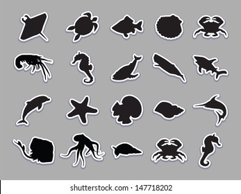 Vector set of silhouettes of 20 marine animals on a white background
