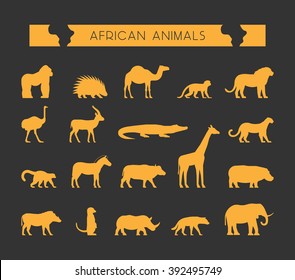 Vector set of silhouettes of African animals. Vector silhouette of lion, leopard, monkey and crocodile. Geometric animals of Africa. Gold silhouette of a lemur, giraffe, hyena and elephant.