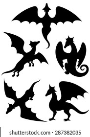 Vector set of silhouettes of dragons stencil