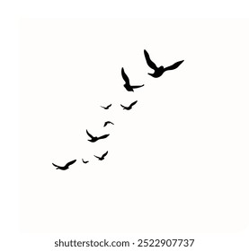 A vector set of silhouettes features a flock of flying birds against a white background, ideal for tattoo designs or nature-themed art. Perfect for showcasing the elegance and freedom of wild birds.