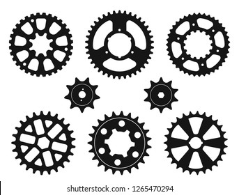 Vector set of silhouettes of the gear wheels and sprockets