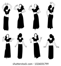 Vector set of silhouettes of slim girls with long hair dancing in long skirts isolated on white background. Icon of girls dancing tribal