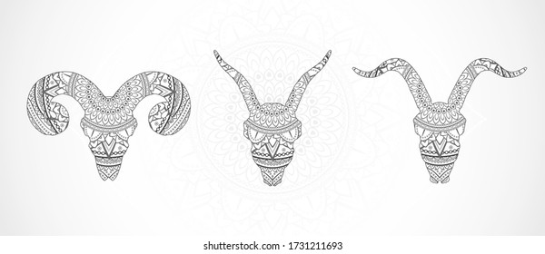 Vector set of skulls ram and goats with ethnic pattern. Black image on white decorative background. Ornate silhouette.