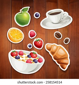 Vector set of stylized food icons on wood background. There are a cup of coffee, some berries, an orange, an apple, muesli and croissant in the set. 