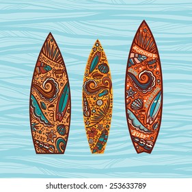 Vector set of surfboards. Image on a boards with elements of surfing. 