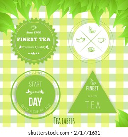Vector set of tea badges  fine quality on green squared texure with leaves.EPS10.