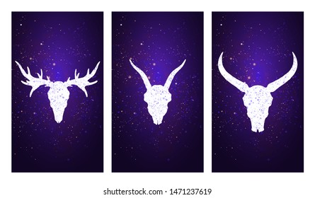 Vector set of three illustrations with silhouettes skulls deer, goat, and buffalo on purple starry sky background. In blue color. For you design, print, tattoo or magic craft.