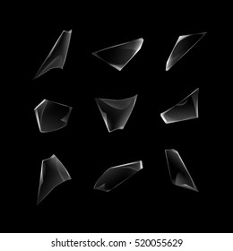Vector Set of Transparent Broken Shattered Glass Window Pieces with Sharp Edges Close up Isolated on Dark Black Background