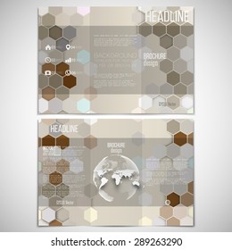 Vector set of tri-fold brochure design template on both sides with world globe element. Hexagonal modern stylish geometric brown background. Colored honeycombs on brown background.