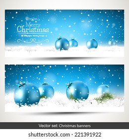 Vector set of two Christmas banners with blue baubles in the snow