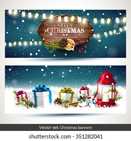 Vector set of two Christmas banners with gift boxes,lantern and wooden sign in winter landscape