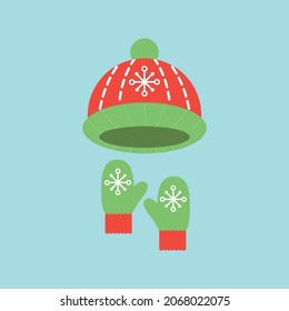vector set of two mittens and hats. flat image of christmas hats and mittens. holiday accessories