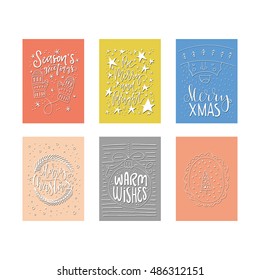 Vector set of unique Christmas cards with handdrawn lettering. Xmas quotes collection. New Year greetings isolated on background.