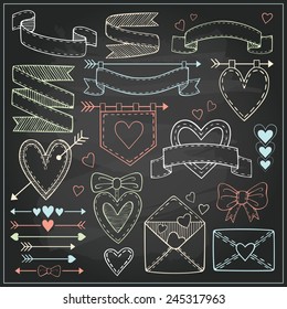 Vector set of Valentine`s Day hand drawn design elements on chalkboard 
