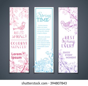 Vector set of vertical floral banners. Spring blossoms, leaves and birds on tree branches. Spring time. Hello spring! Best spring ever! Bright colourful outlined illustration on white background.