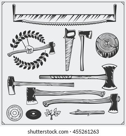 Vector set of vintage carpentry tools. Axes and saws.