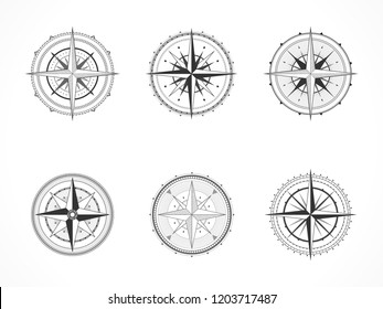 Vector set of vintage compasses or marine wind roses. Collection in line art style. Black line. Isolated on white background.