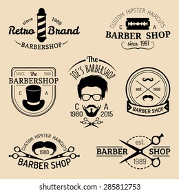 Vector set of vintage hipster barbershop logos. Hairdresser badges or emblems collection.