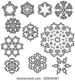 Vector set of vintage snowflakes for your winter design. Black ornate snowflakes isolated on white background.