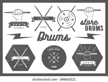 Vector set of vintage style drums labels, emblems and logo. Music design elements drum, drumsticks, hand, snare. Lettering and typography. 
