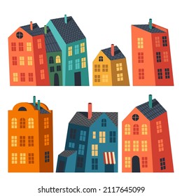 Vector set of vivid isolated buildings. Collection of various houses. Simple irregular shape buildings with tile roofs and chimneys. Doodle graphic. Flat illustrations of lovely multicolor houses