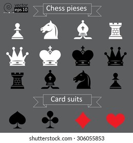 Vector set of white and black chess pieces and card suits icons on a gray background