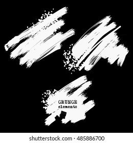 Vector set of white brush strokes on black background. Grunge isolated elements. Texture brushes for your design. Freehand. Watercolor splash. Acrylic stamp. Vector illustration