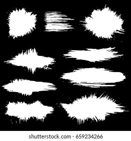 Vector set of white brush strokes on black background. Grunge isolated elements. Brushes for your design. Freehand. Ink splash. Vector illustration.