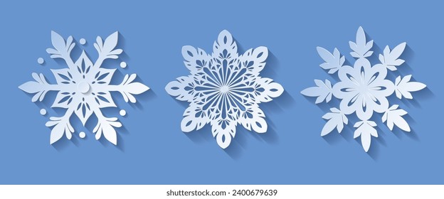 Vector set white christmas paper cut 3d snowflake with shadow on blue colored background. Winter design elements for presentation, banner, cover, web.