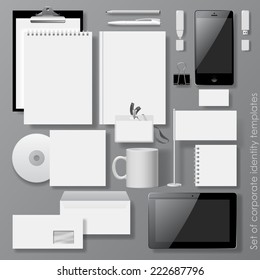 Vector set of white design corporate identity templates with notepad, envelope, business card, CD, Mobile phone, Tablet computer, flag, badge, mug  and other office accessories