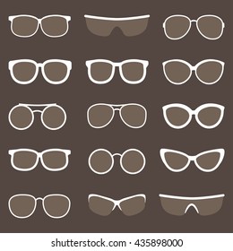 Vector set of white glasses silhouettes on dark background