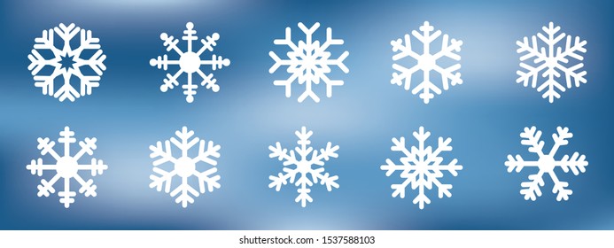 Vector set of white snowflakes icons winter ornaments on blue background.