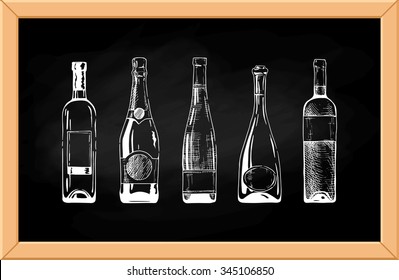 Vector set of wine and champagne bottles on chalkboard background. 