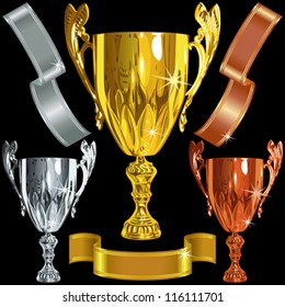 vector set Winning success gold, silver, bronze cups and gold ribbons on the black background