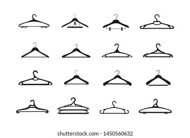 
Vector set of wooden and plastic clothes hangers, flat design.