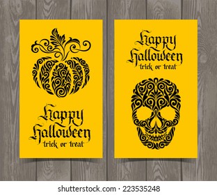 Vector set of yellow cards with ornate skull and pumpkin. Happy Halloween party invitation on wood background. Holidays calligraphic inscription