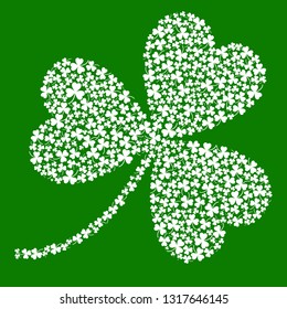 vector shamrock made of small shamrocks on green background