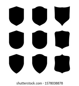 Vector Shield icon. Heraldic shields, security black labels. Knight award, medieval royal vintage badges isolated vector. Protect shape arms silhouette elements set.