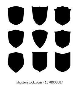 Vector Shield icon. Heraldic shields, security black labels. Knight award, medieval royal vintage badges isolated vector. Protect shape arms silhouette elements set.