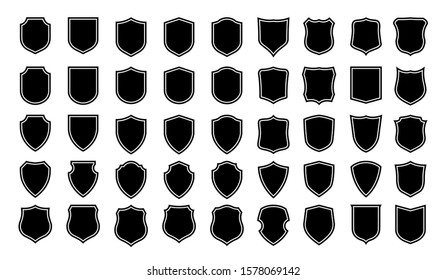 Vector Shield icon. Heraldic shields, security black labels. Knight award, medieval royal vintage badges isolated vector. Protect shape arms silhouette elements set.
