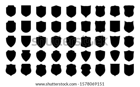 Vector Shield icon. Heraldic shields, security black labels. Knight award, medieval royal vintage badges isolated vector. Protect shape arms silhouette elements set.