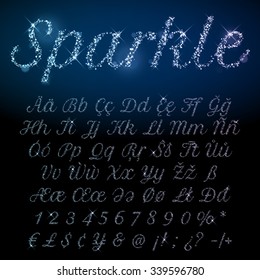 Vector shining alphabet font set of glittering sparkles